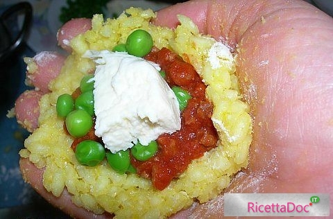 Arancini di riso ripieno